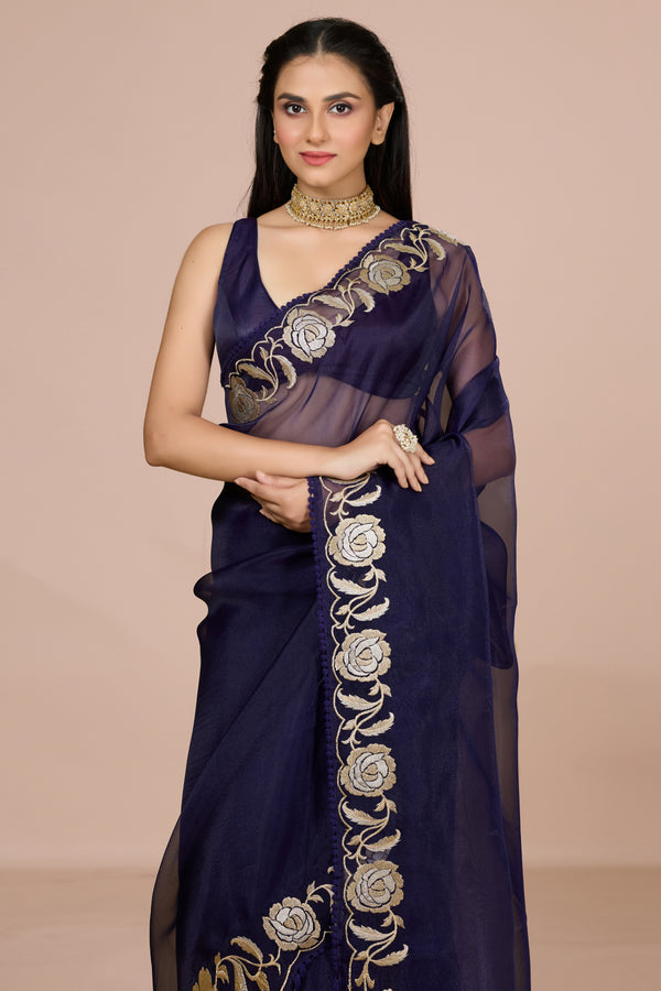 Blue Tissue Saree Adorned With An Embroidered Floral Border